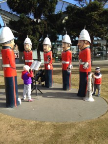 The Volunteer Rifle Band with Alexis as conductor and Reid playing the tuba